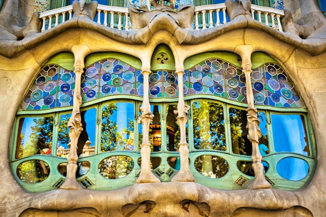 Modernist building in coloured glass and stone Casa Batilo by Gaudi in Barcelona