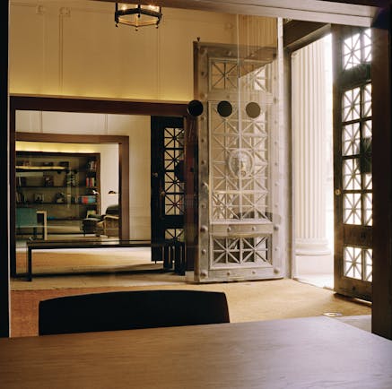 Grand Hotel Central Barcelona entrance large wooden doors stone tiles