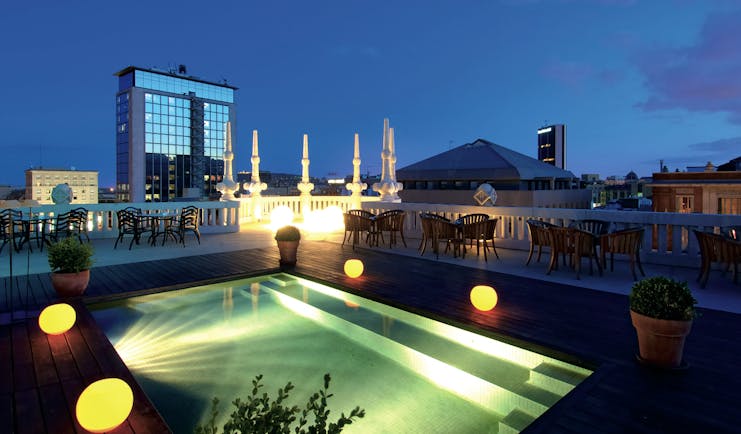 Hotel Casa Fuster Barcelona pool rooftop terrace at night city views
