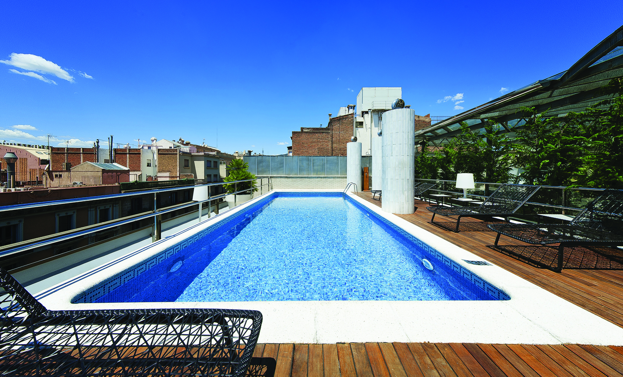 Hotel Claris Barcelona pool sun loungers views of city