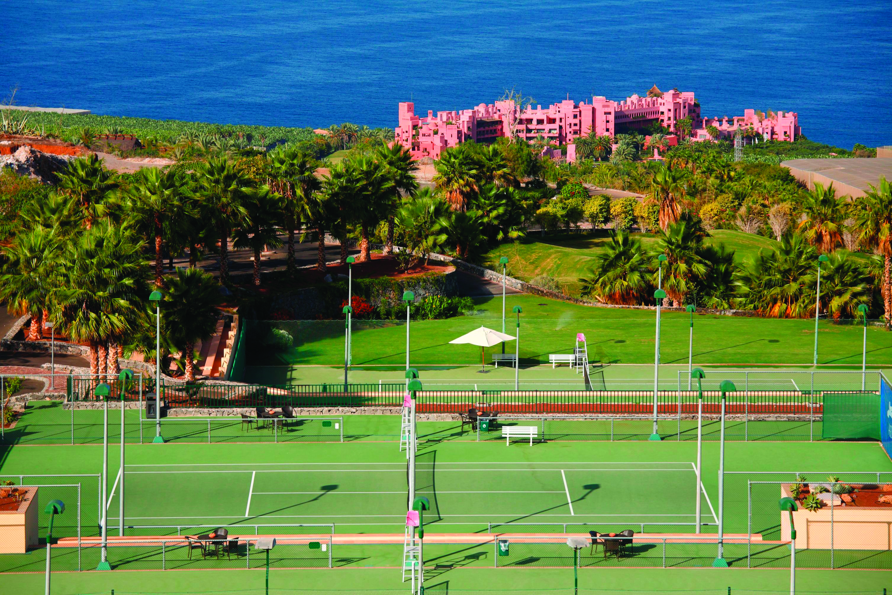 Abama Tenerife tennis courts hotel and sea in background