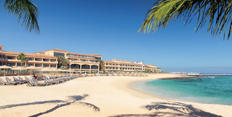 Gran Hotel Atlantis Bahia Fuerteventura beach sun loungers sandy beach palm trees