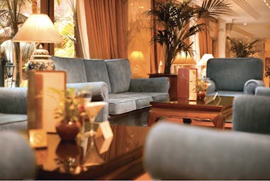 Hotel Botanico Tenerife bar lounge indoor seating area sofas modern décor