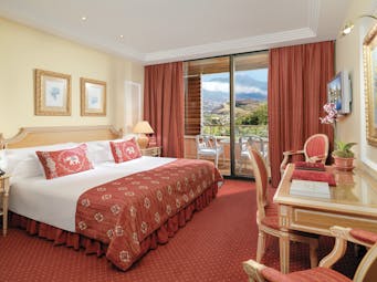 Hotel Botanico Tenerife deluxe double guest room bed desk balcony traditional décor
