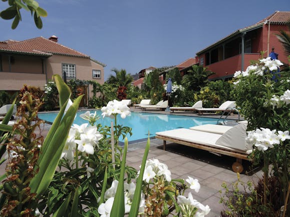 Hacienda de Abajo Canary Islands pool sun loungers flowers