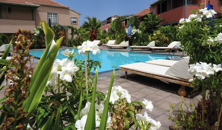 Hacienda de Abajo Canary Islands pool sun loungers flowers