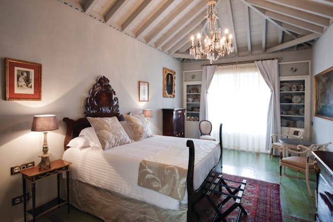 Hacienda de Abajo Canary Islands premium bed wooden ceiling chandelier ornate décor