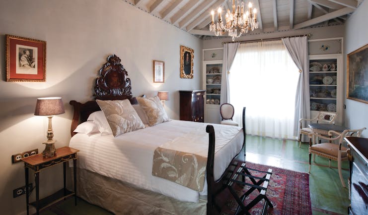 Hacienda de Abajo Canary Islands premium bed wooden ceiling chandelier ornate décor