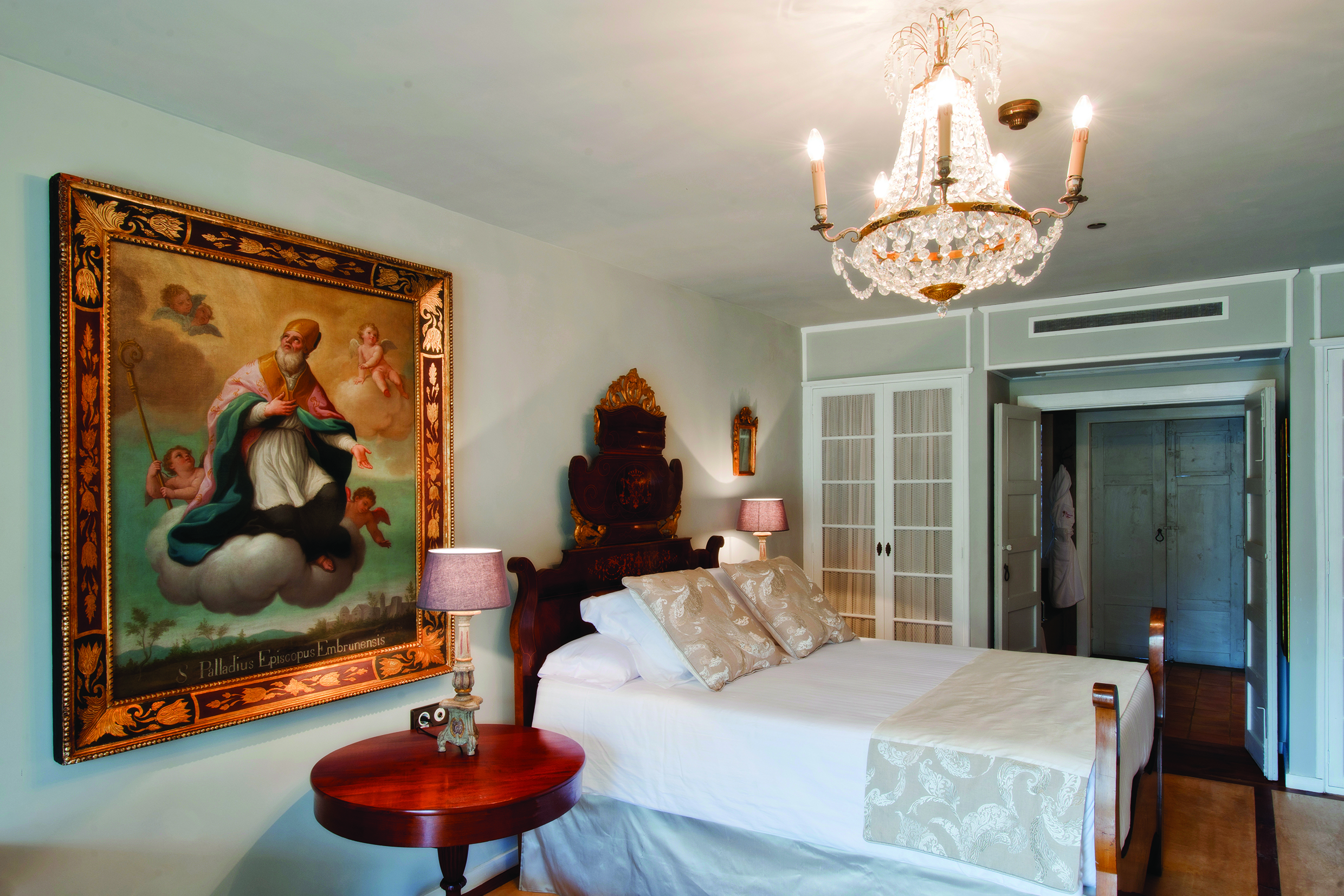 Hacienda de Abajo Canary Islands premium room bed artwork chandelier ornate décor