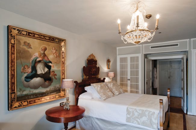 Hacienda de Abajo Canary Islands premium room bed artwork chandelier ornate décor