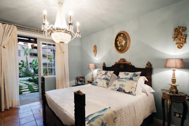 Hacienda de Abajo Canary Islands superior bedroom chandelier bed ornate décor garden terrace