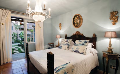 Hacienda de Abajo Canary Islands superior bedroom chandelier bed ornate décor garden terrace