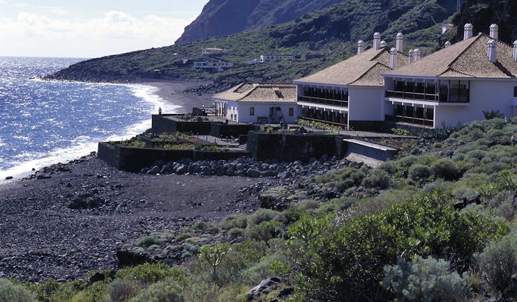 Parador de el Hierro Canary Islands beach hotel on secluded beach front mountains