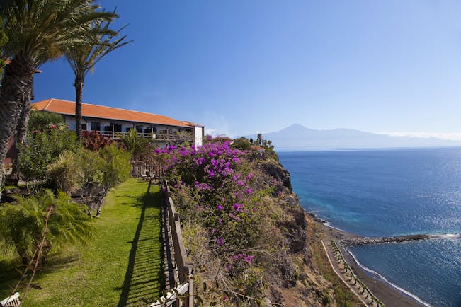 Parador de la Gomera Canary Islands gardens lawn trees flowers overlooking coastline and sea