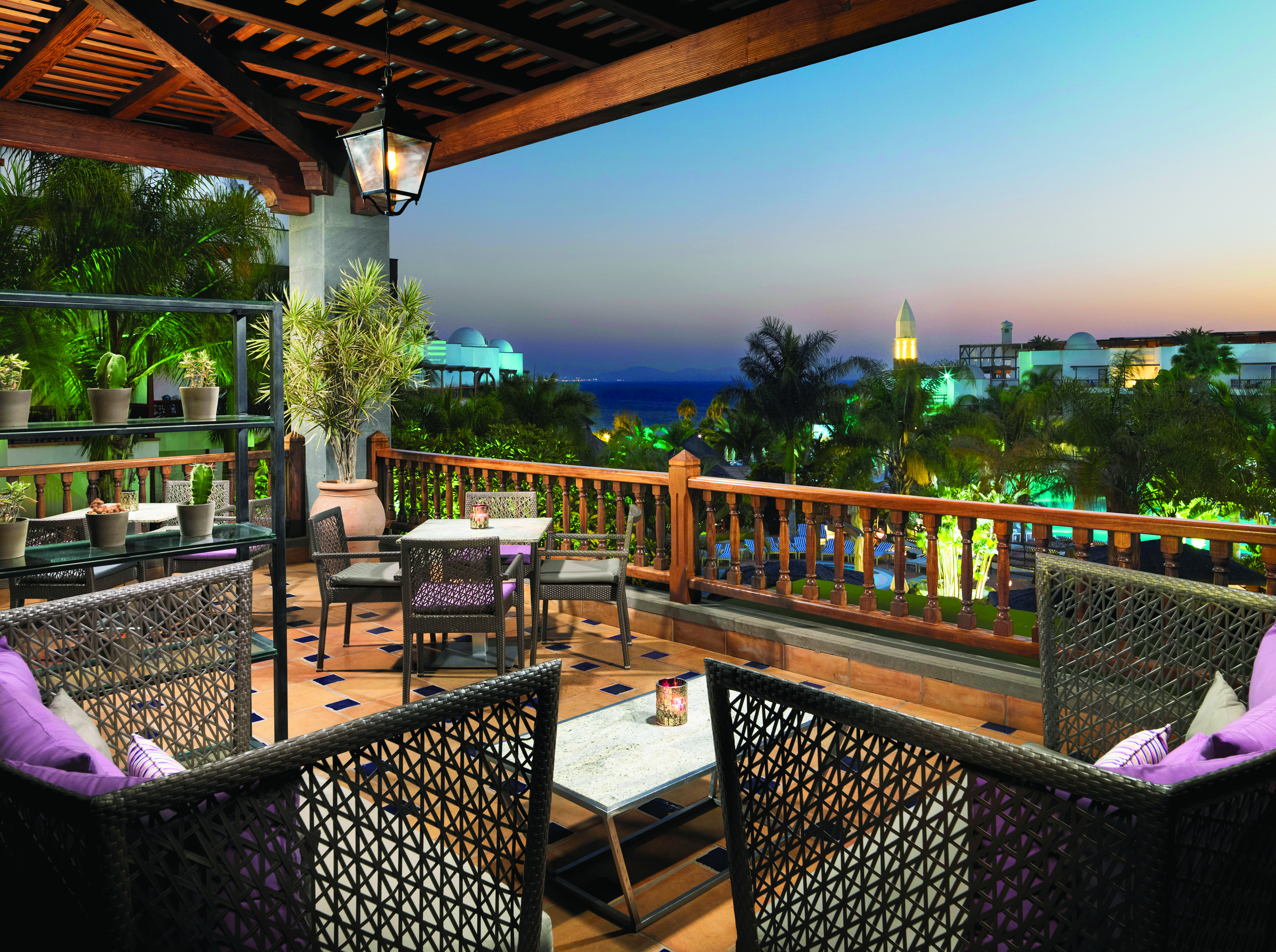 Princesa Yaiza bar terrace, covered seating area with views over the resort, wicker furniture