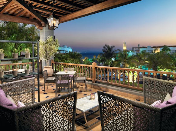 Princesa Yaiza bar terrace, covered seating area with views over the resort, wicker furniture