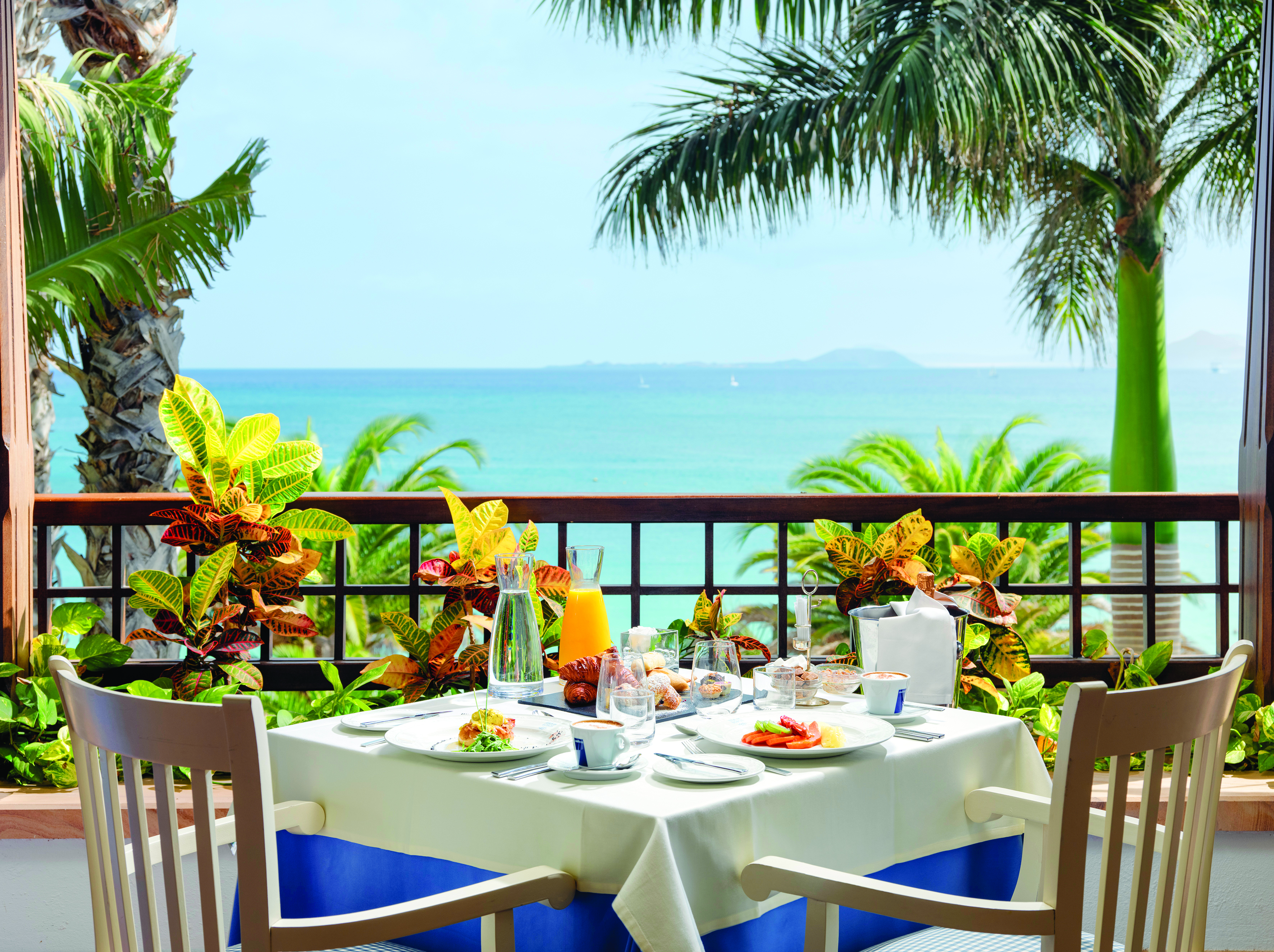 Princesa Yaiza table on private balcony set for breakfast, views over the sea