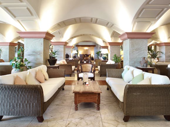 Princesa Yaiza piano bar, indoor seating area, sofas, armchairs, marble floors, elegant decor