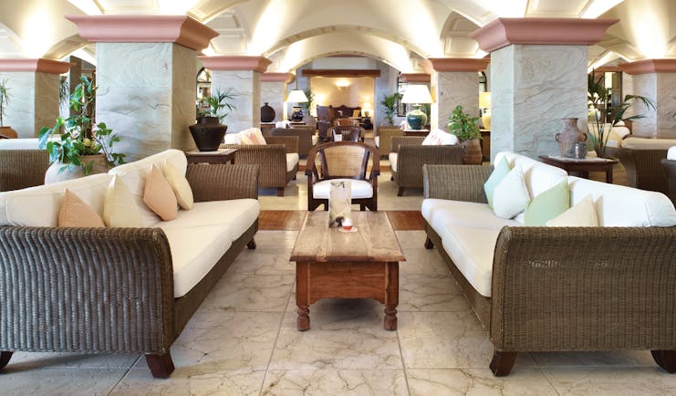 Princesa Yaiza piano bar, indoor seating area, sofas, armchairs, marble floors, elegant decor