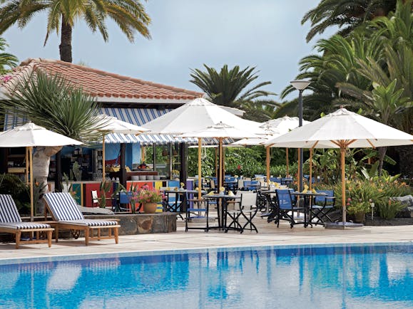 Seaside Grand Hotel Residencia Canary Islands pool side bar sun loungers