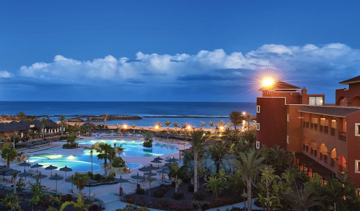 Sheraton Fuerteventura Canary Islands pools at night sea in background palm trees
