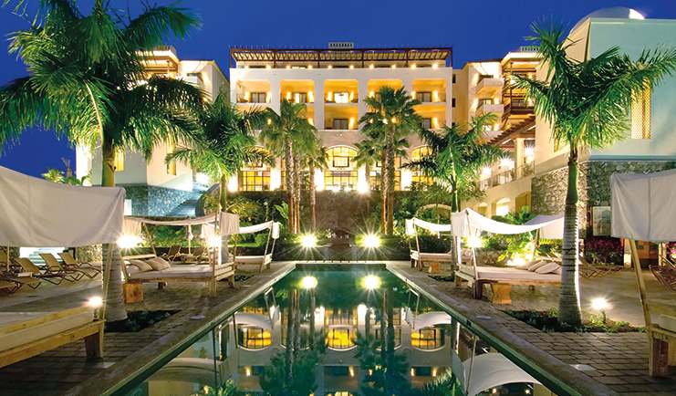 La Plantacion del Sur Tenerife exterior at night pool hotel lit up canopied sun loungers