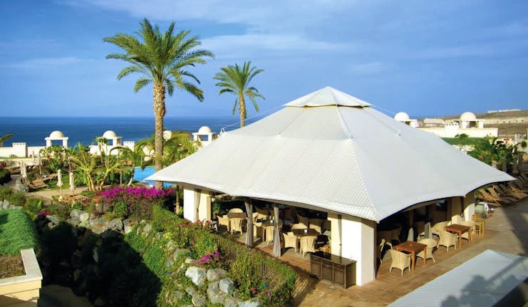 La Plantacion del Sur Tenerife pool bar and restaurant covered outdoor dining area poolside