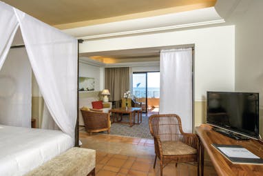 La Plantacion del Sur Tenerife suite canopied bed lounge area balcony modern décor