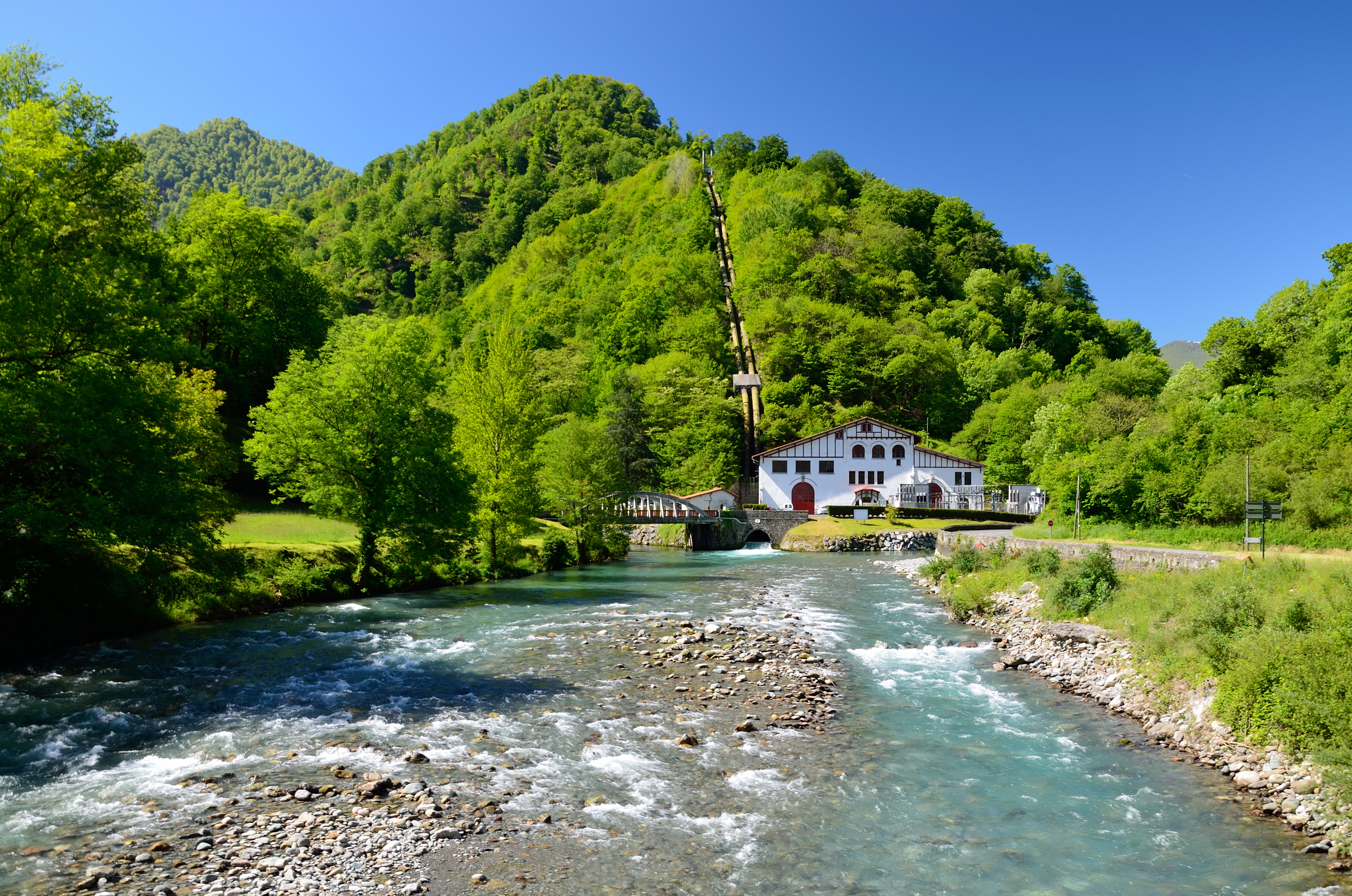Mountain river with small half timebered house in the Spanish Pyrenees