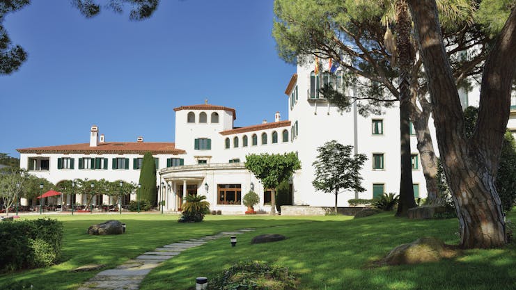 Hostal de la Gavina Catalonia exterior lawns trees hotel building