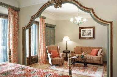 Hostal de la Gavina Catalonia junior suite lounge area armchair sofa traditional décor