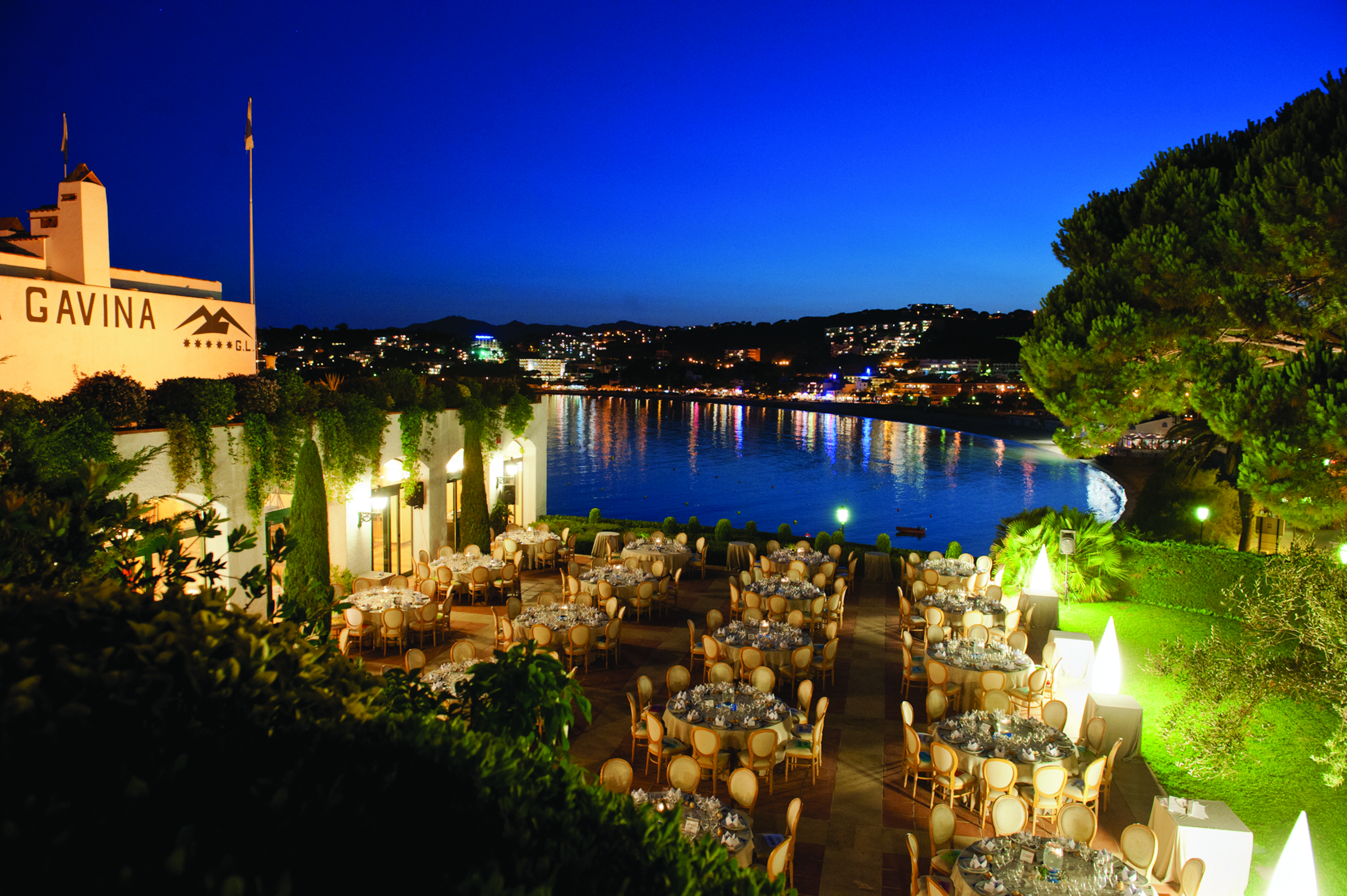 Hostal de la Gavina Catalonia restaurant terrace at night views over pool