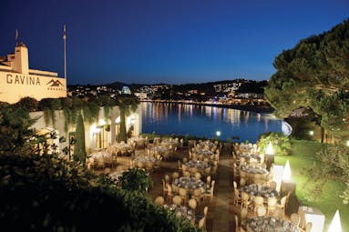 Hostal de la Gavina Catalonia restaurant terrace at night views over pool