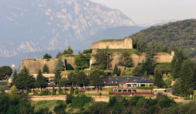 Hotel el Castell de Ciutat Catalonia exterior hotel building mountains in background