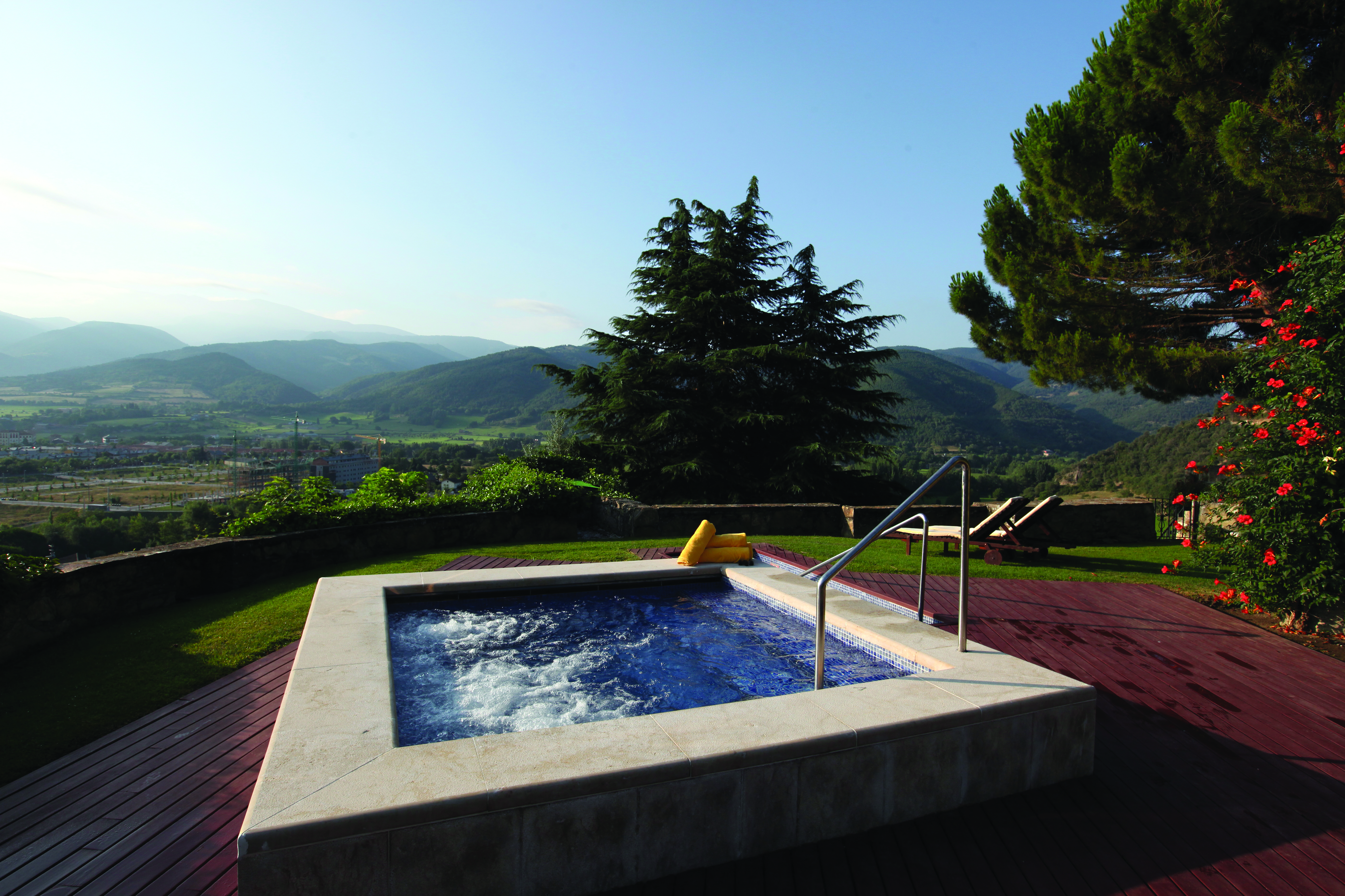 Hotel el Castell de Ciutat Catalonia hot tub outdoor terrace views of mountains and countryside