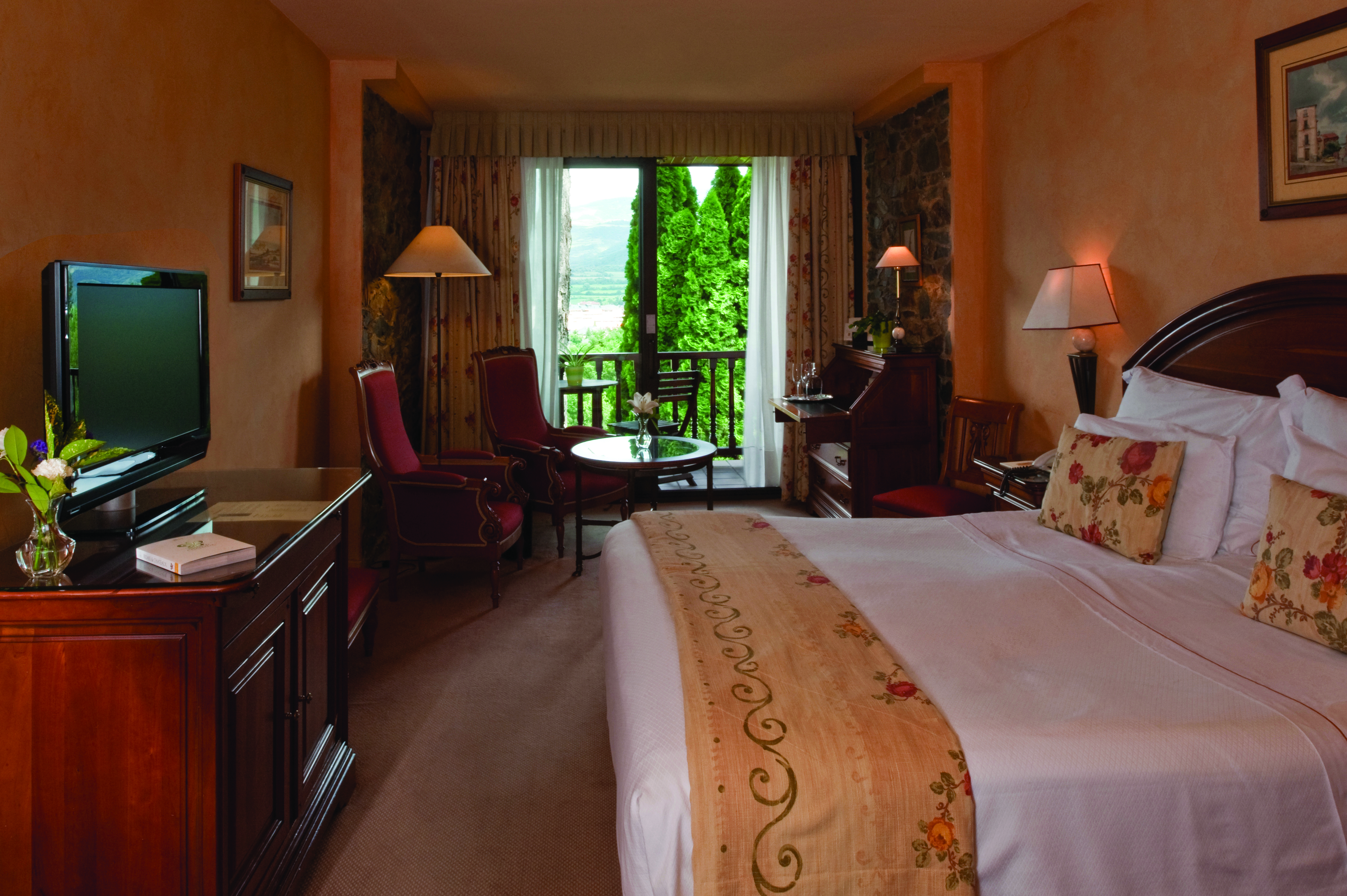Hotel el Castell de Ciutat Catalonia superior bedroom bed sitting area balcony