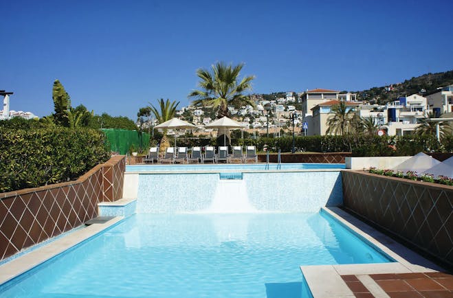 Hotel Estela Eastern Spain pool terrace sun loungers umbrellas