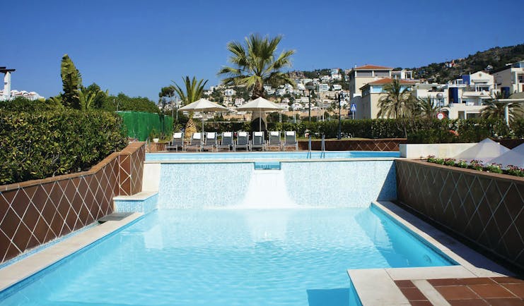 Hotel Estela Eastern Spain pool terrace sun loungers umbrellas