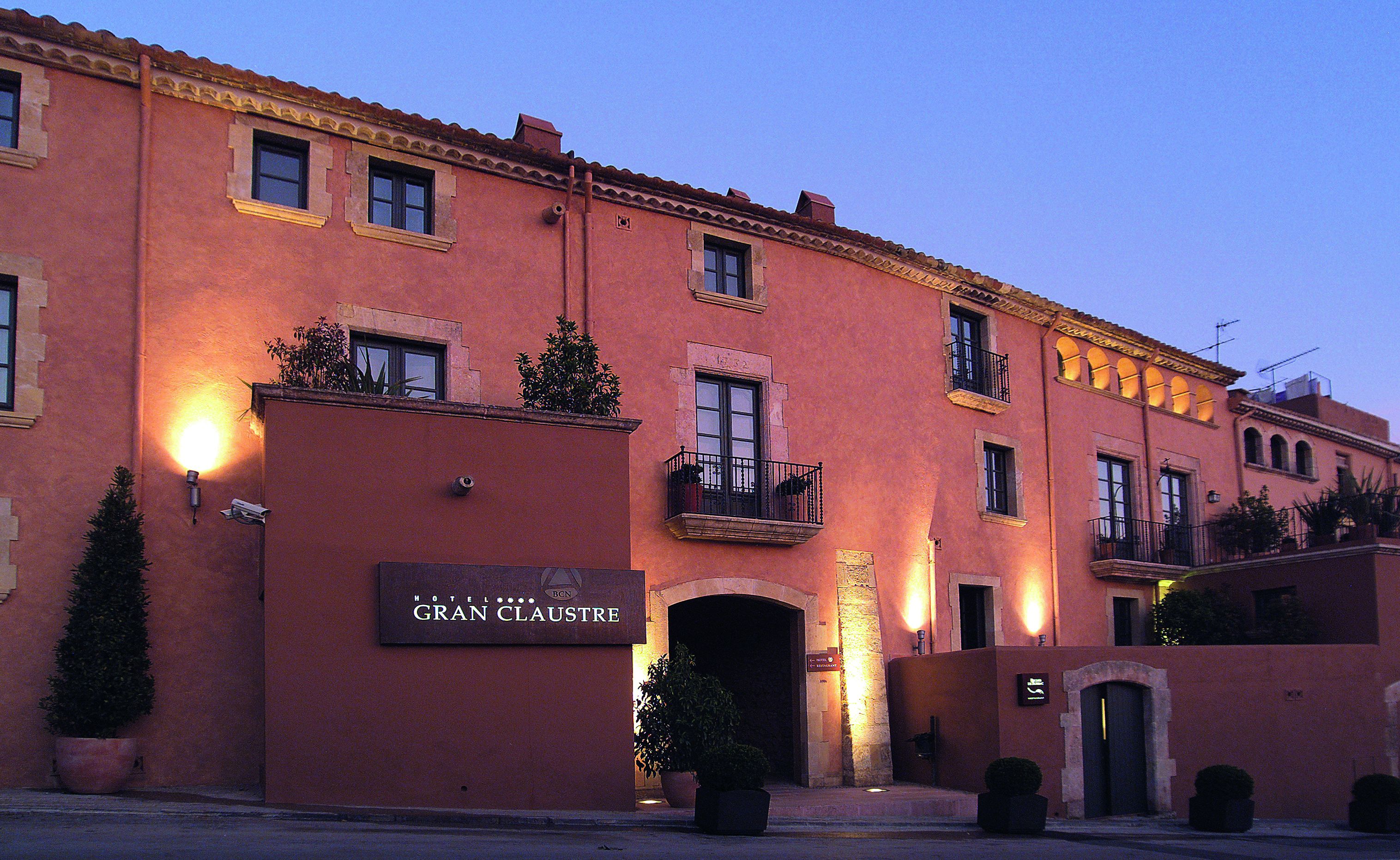 Gran Claustre Eastern Spain entrance stone building potted plants
