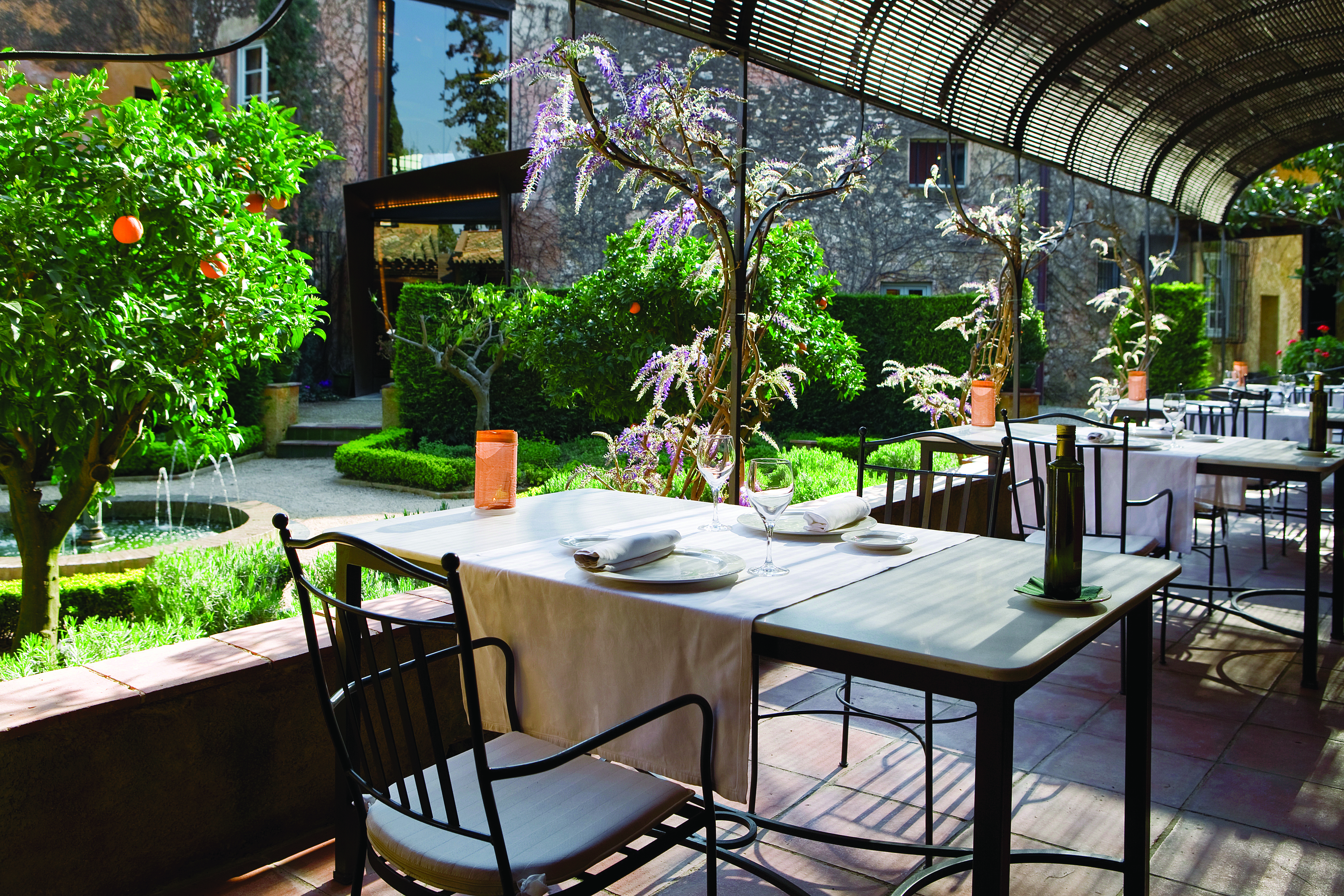 Hotel Mas la Boella Eastern Spain dining terrace outdoor dining gardens orange trees