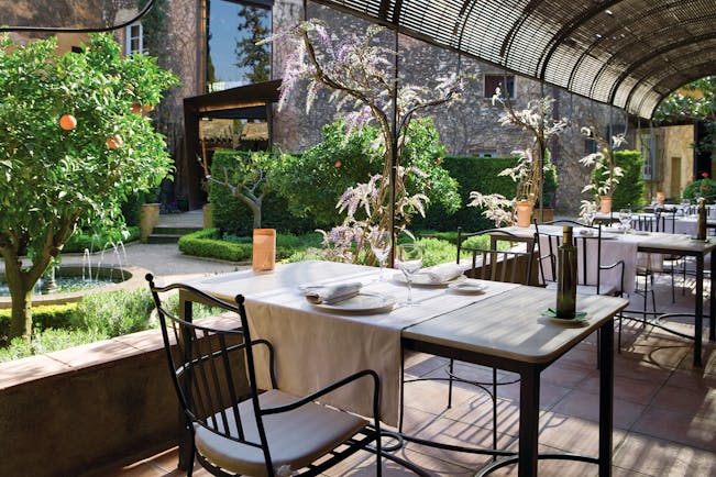 Hotel Mas la Boella Eastern Spain dining terrace outdoor dining gardens orange trees