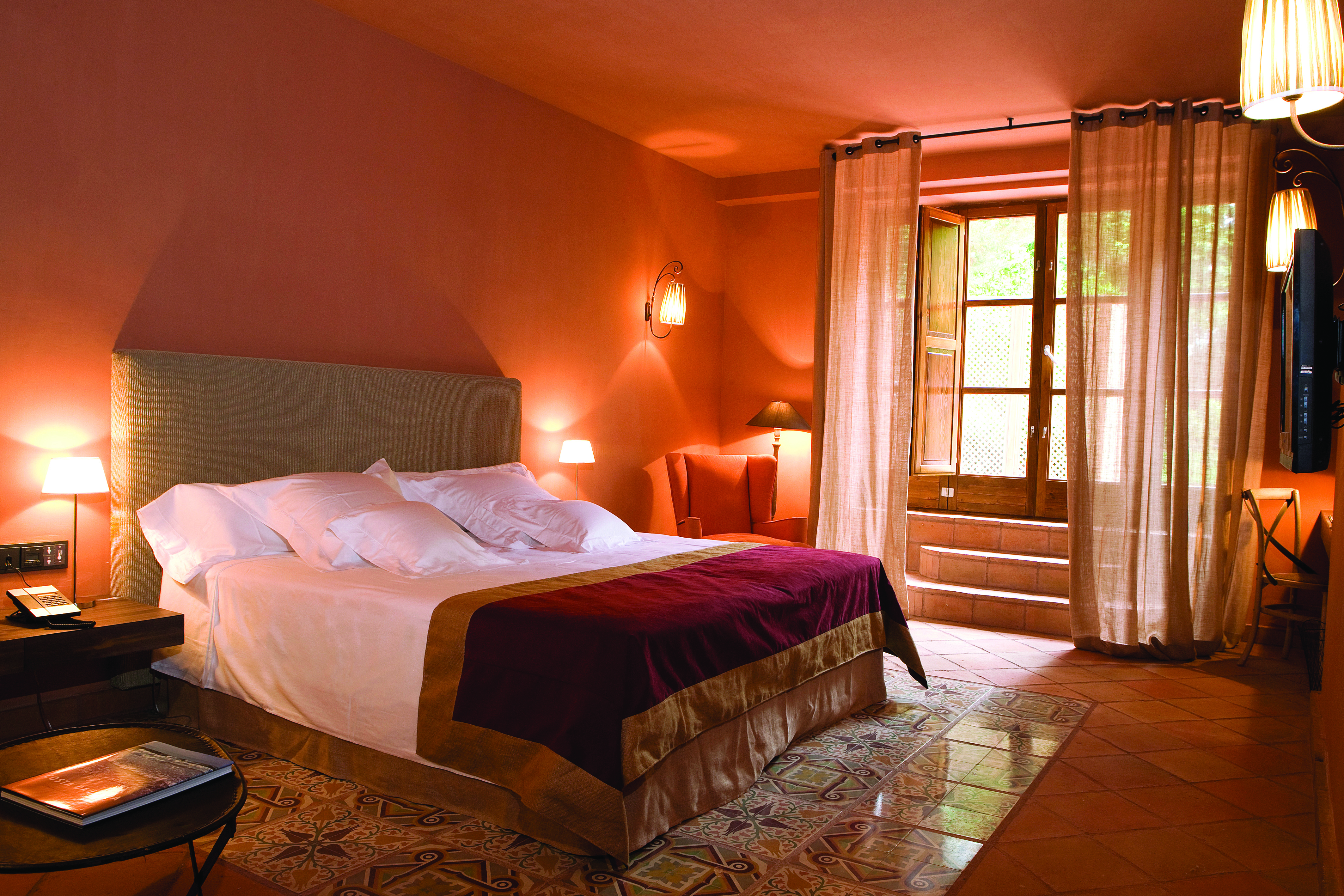 Hotel Mas la Boella Eastern Spain suite bedroom bed large windows cosy décor