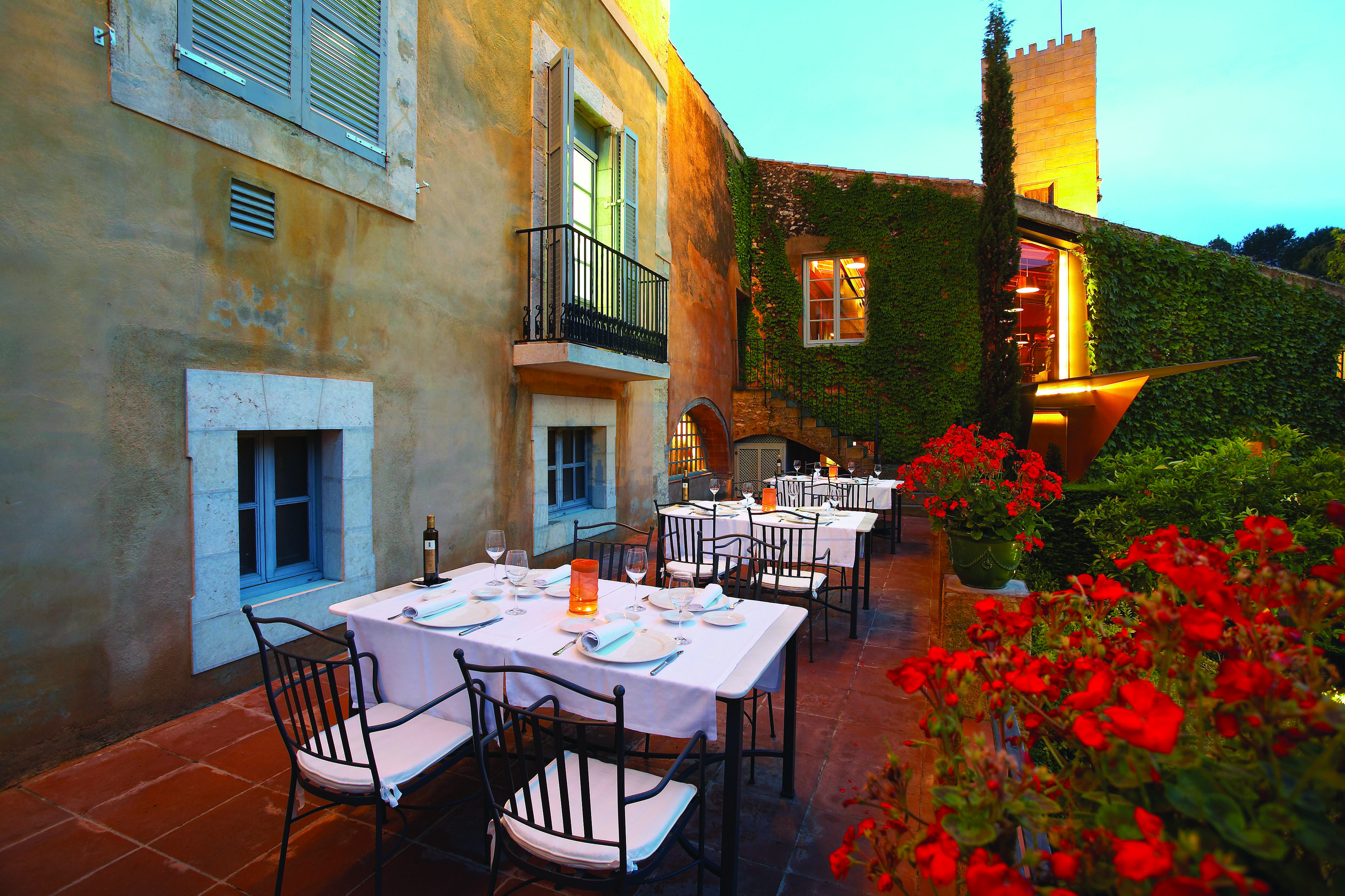 Hotel Mas la Boella Eastern Spain outdoor dining area flowers