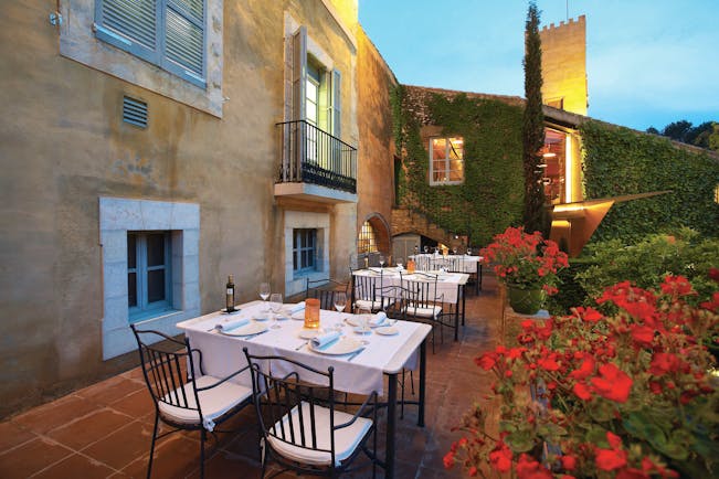 Hotel Mas la Boella Eastern Spain outdoor dining area flowers