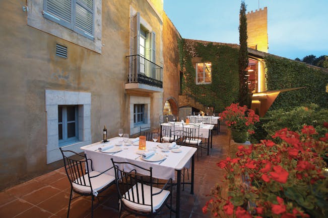 Hotel Mas la Boella Eastern Spain outdoor dining area flowers