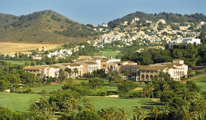 La Manga Club Resort Eastern Spain Principe Felipe aerial view hotel complex palm trees golf course