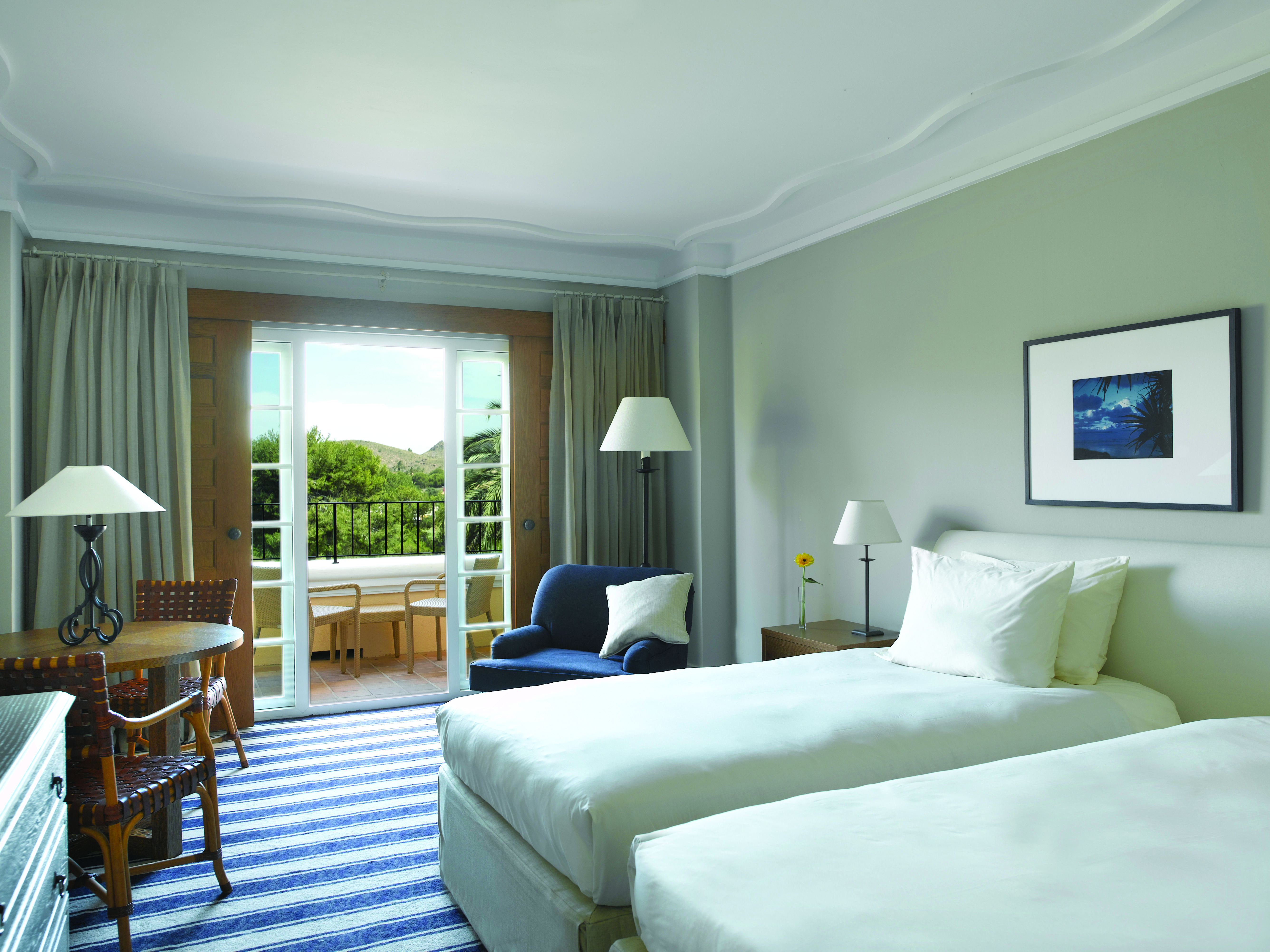 La Manga Club Resort Eastern Spain standard bedroom twin beds chair balcony mountain view