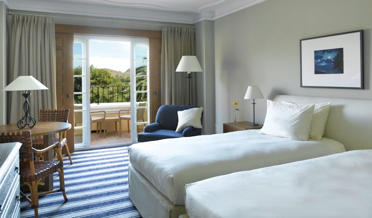La Manga Club Resort Eastern Spain standard bedroom twin beds chair balcony mountain view