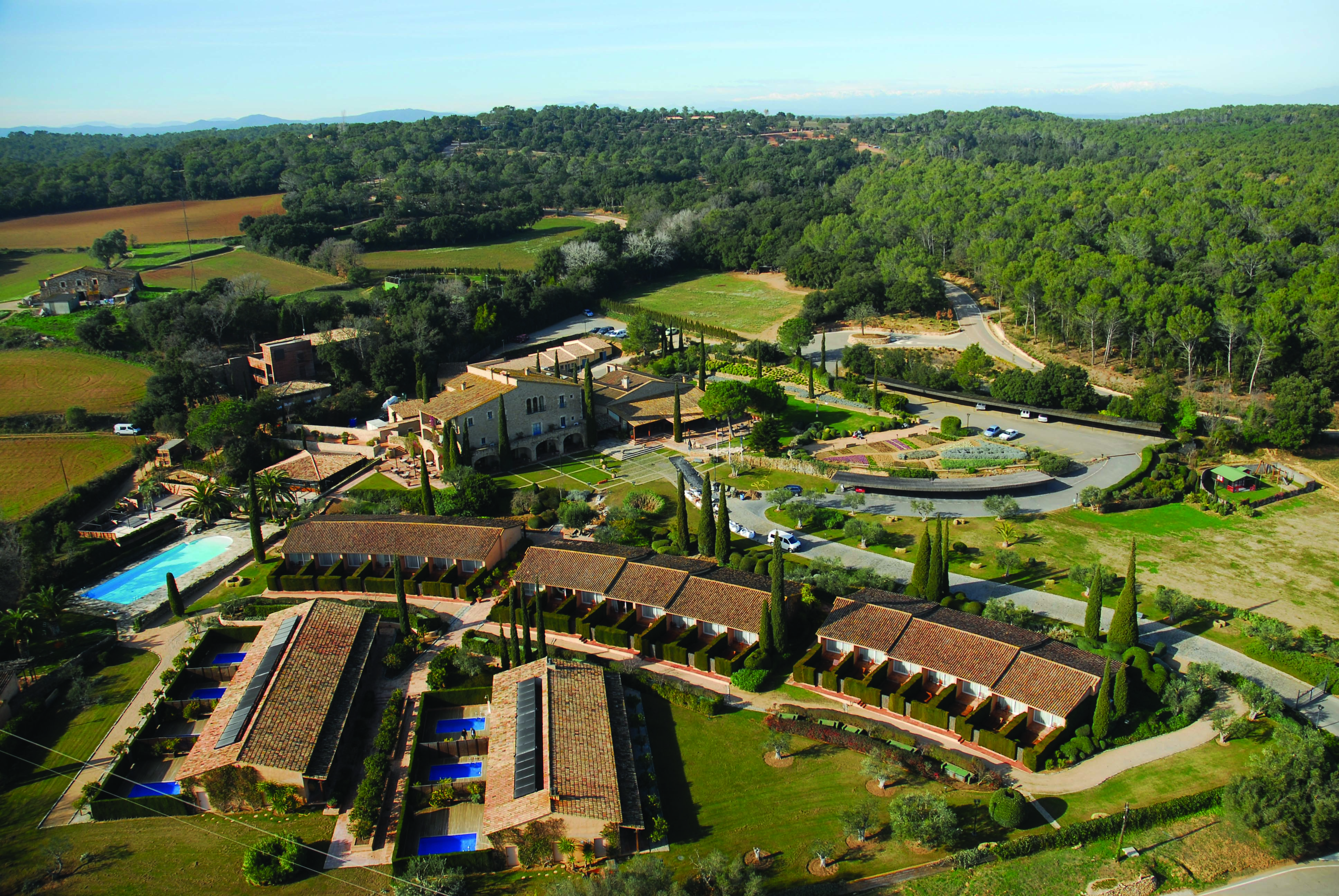 Mas de Torrent Catalonia aerial shot of resort hotel pool countryside