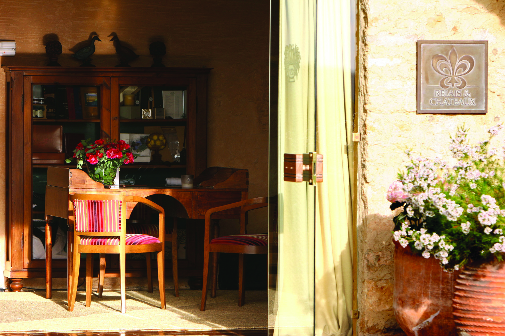 Mas de Torrent Catalonia entrance door desk chairs rustic décor